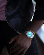 Silver/Blue turquoise dial Mansa - from ASOROCK WATCHES  a black african american owned luxury unique watch brand with swiss rolex, Audemars Piguet, patek homage inspired style watches. Also a custom vvs moissanite diamond watch maker.